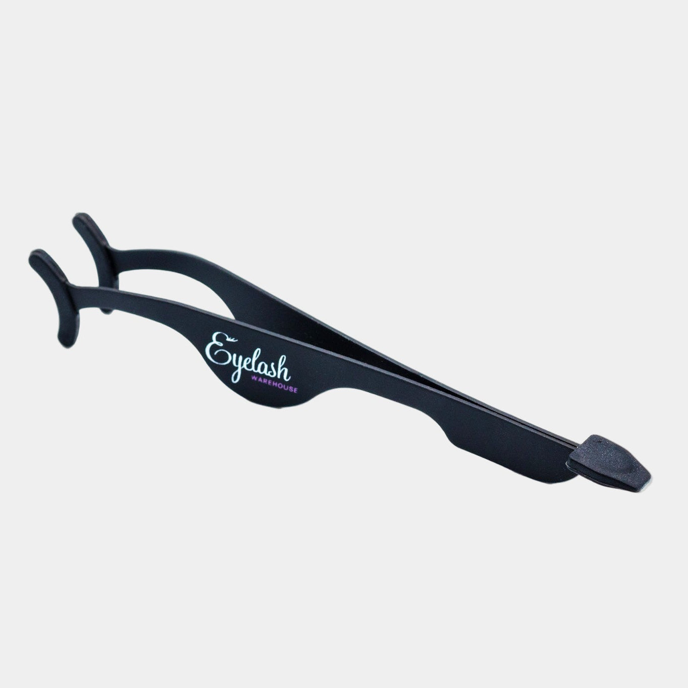 Strip lash applicator tool with ergonomic design and silicone tips shown at a different angle to capture more details