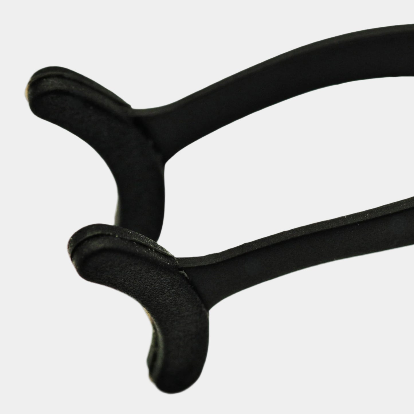 Strip lash applicator tool close up shot  showing ergonomic design and silicone tips